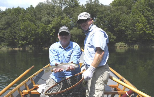 Frank Brown and Hagan Wonn with a Cumberland River rainbow trout.